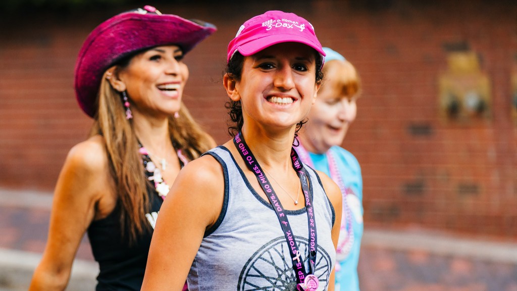Woman exercising in pink hat