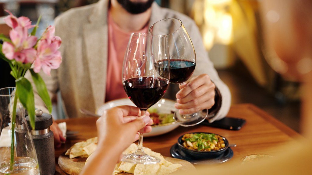 Red wine being toasted