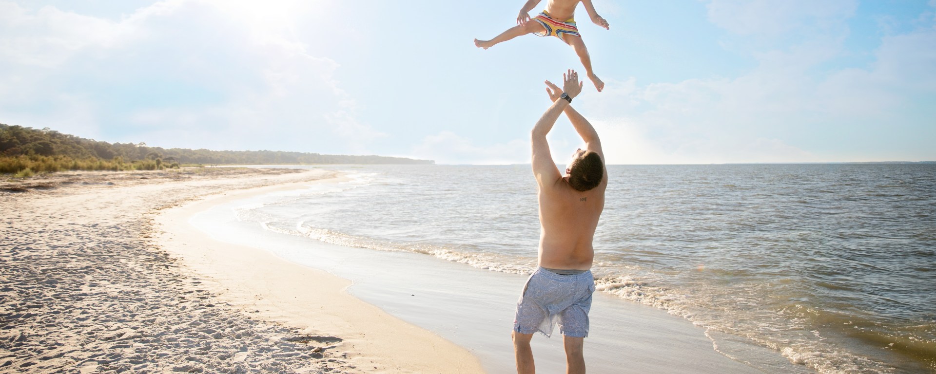 Man with the dad bod playing with his kid