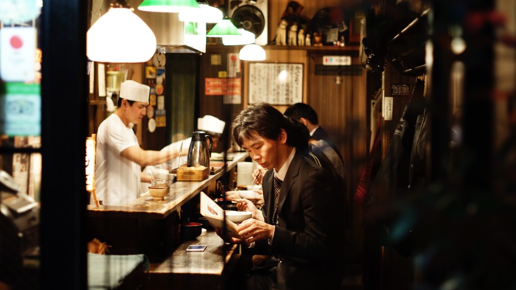 Japanese people at a bar eating to 80% full, practicing hara hachi bu