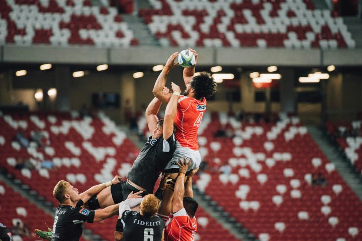 Rugby player being lifted